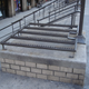 Besides being an eye-sore, these wrought iron additions serve no purpose other than to make a potentially pleasant space in New York City distinctly unpleasant.